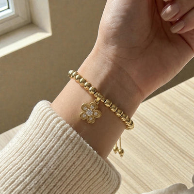 Gold Beaded Spin Bracelet  Flower Charm Adjustable Bangle  Dainty Gold Plated Jewelry